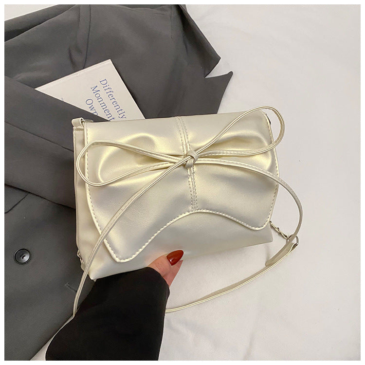 Miss Velora Chloe Bow Crossbody Bag in Pearlescent White